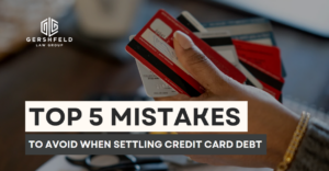 A hand holding multiple credit cards, with the Gershfeld Law Group logo and the text “Top 5 Mistakes to Avoid When Settling Credit Card Debt.