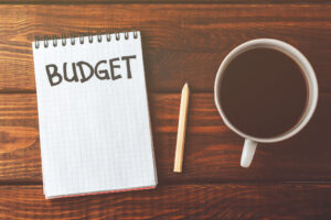 Budget planning notebook on a desk.